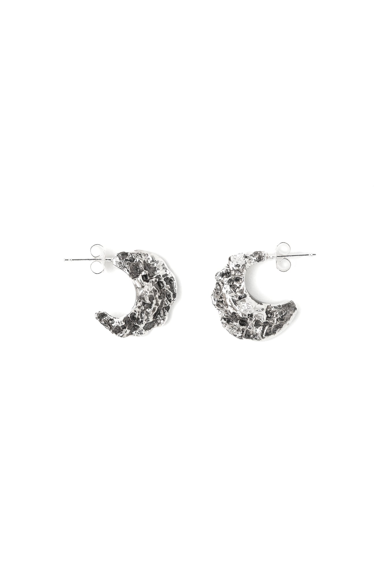 A pair of sterling silver textured hoops earrings in the shape of crescent moon with backings